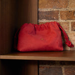 Eva Suede Clutch Bag