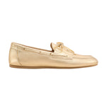 Gold loafer shoe on a white background