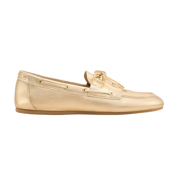 Gold loafer shoe on a white background